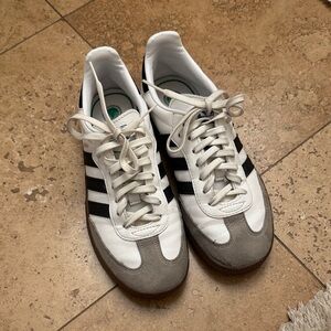 White and Gray Sneakers with Black Stripes